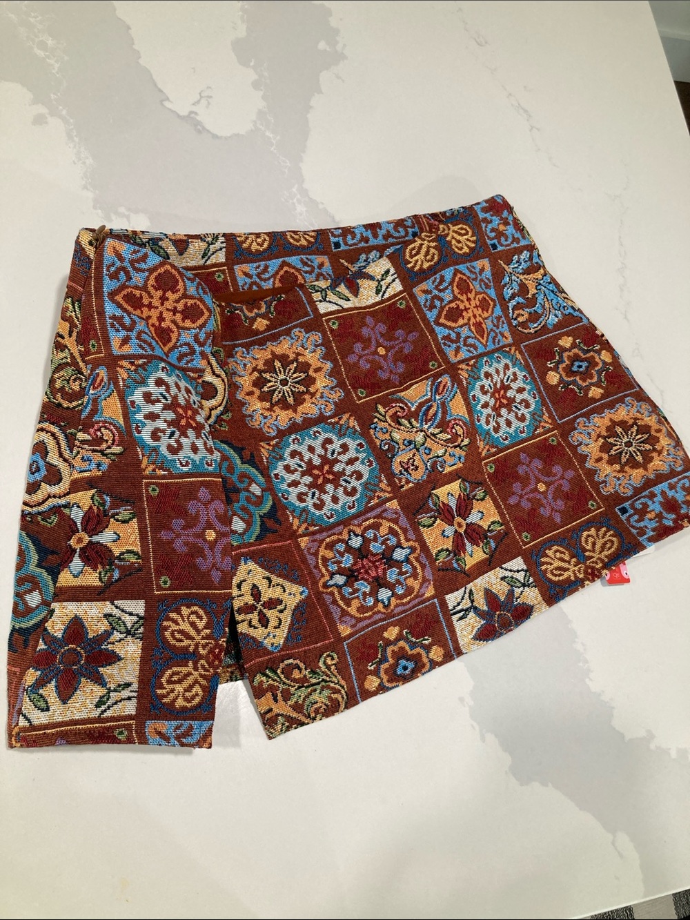 Cider Tile-Print Mini Skort in Rust and Teal